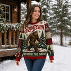 woman modelling a sasquatch squatchin through the snow christmas sweater outside