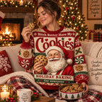 woman on a couch in front of a lit fireplace holding a