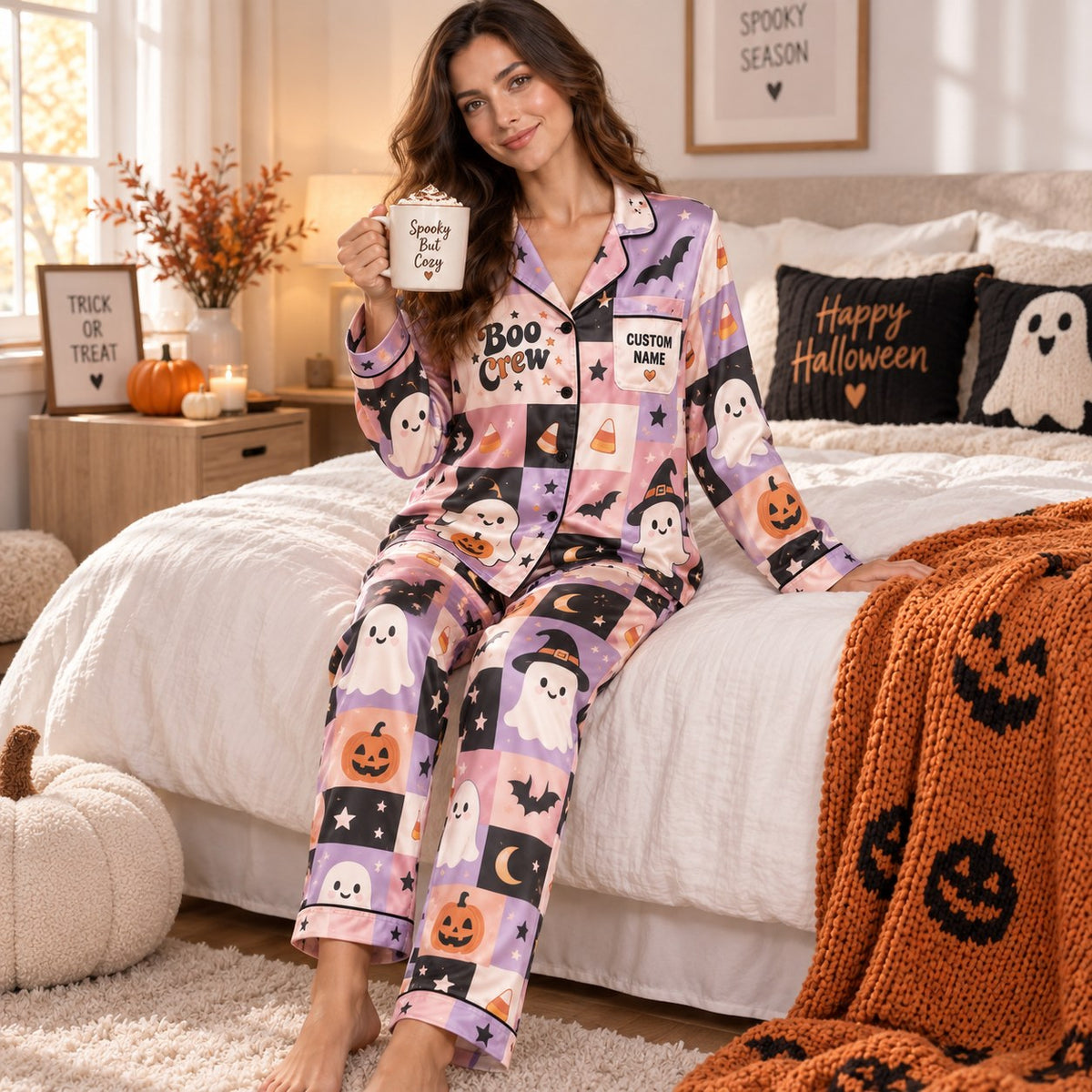 back of halloween satin pajama showing boo crew trick or treat graphic