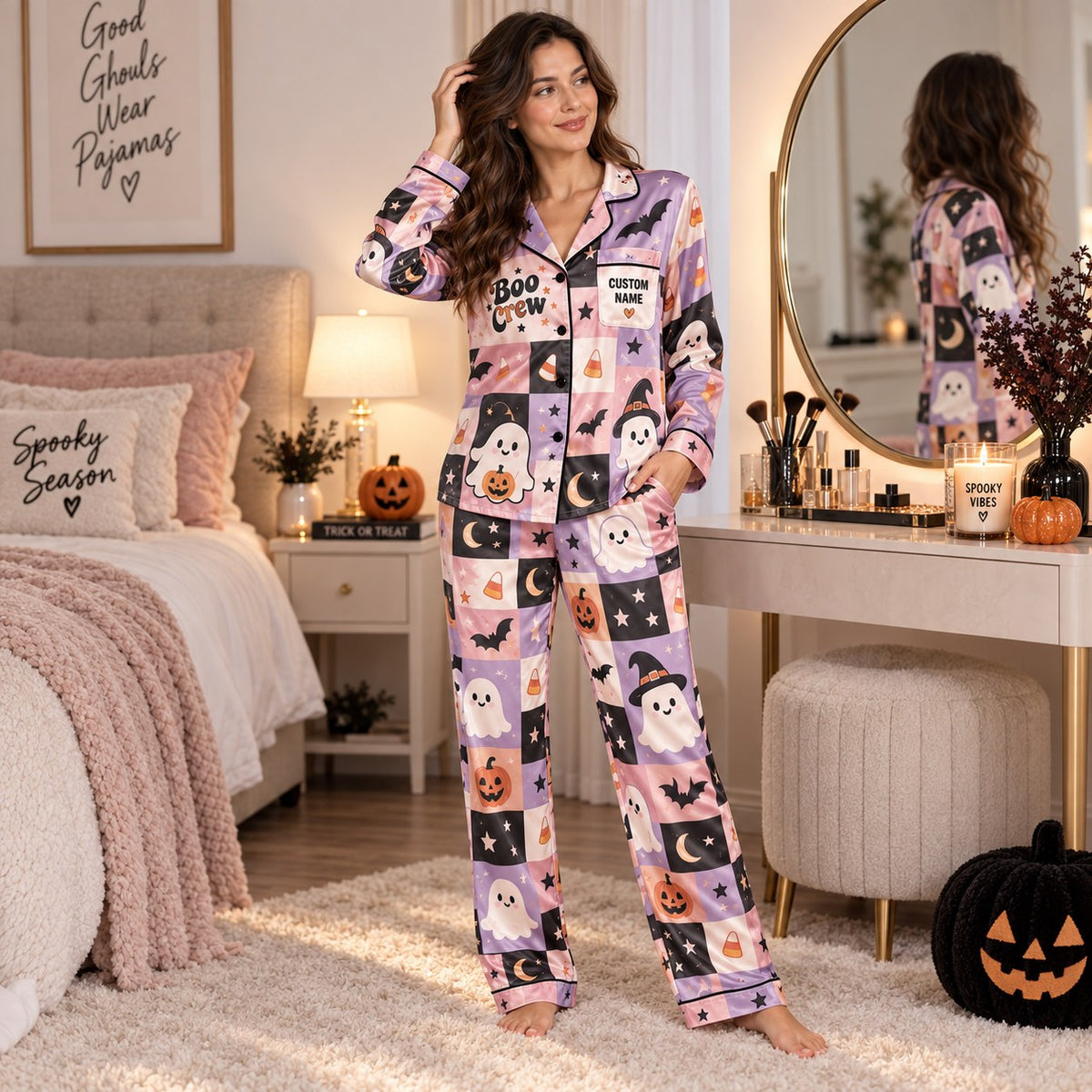 standing woman in purple patchwork satin pajamas with a custom name on the chest