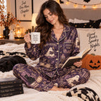 halloween satin pajamas worn with a book and a warm drink