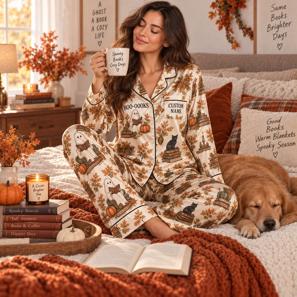 woman reading a book in a matching satin pajama set