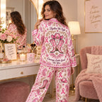 back of pink ribbon satin pyjamas shown in pink bedroom setting