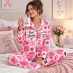 model sitting on bed wearing pink ribbon checkered satin pajamas