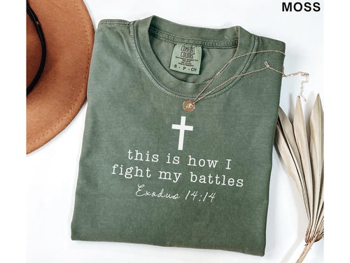 moss green graphic tee with cross and Exodus 14:14 fight my battles