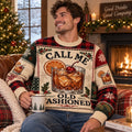 man wearing a call me old fashioned ugly christmas sweater by a