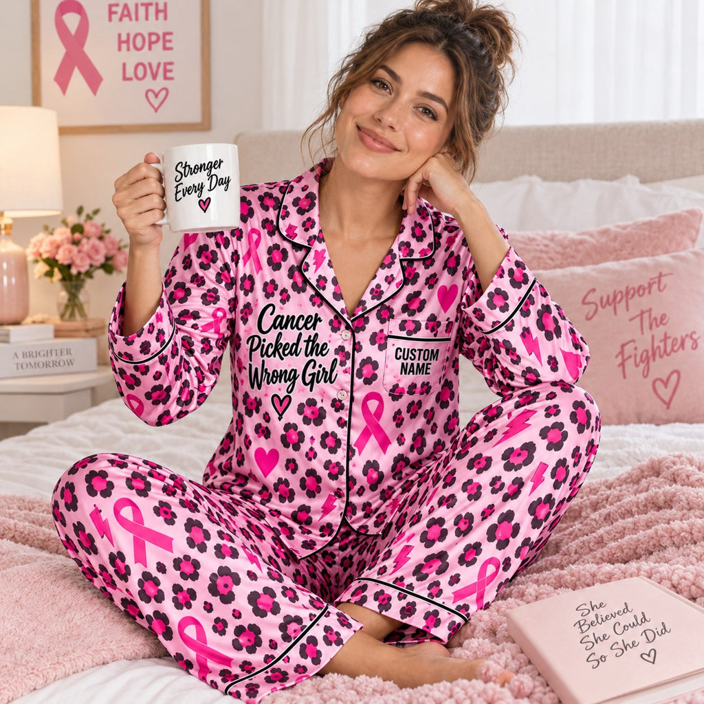 woman in pink leopard satin pajamas holding a brighter mug