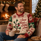 man relaxing by a fireplace in a peanuts ugly christmas sweater holding
