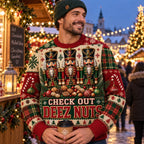 man in a green beanie at a snowy christmas market wearing a
