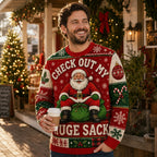 a man smiling in a red and green funny holiday sweater with