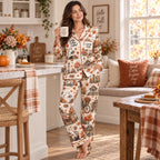 back view of a long sleeve button up satin pajama set covered