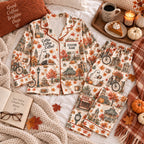 flat lay autumn small-town ghost satin pajamas with a custom name on the chest