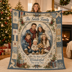 woman holding a custom family photo blanket in a holiday decorated living