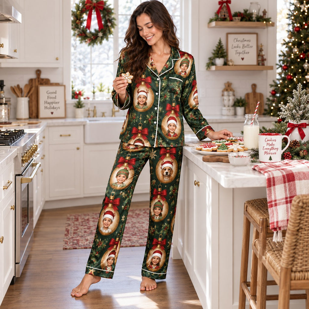 model in kitchen with golden retriever wearing matching family christmas pjs