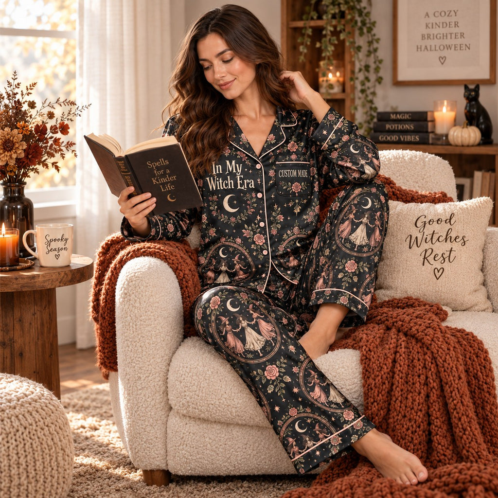woman wearing the multicolor halloween sleepwear holding a mug by a bed