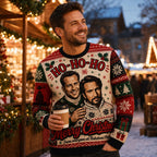man smiling in a die hard merry christmas sweater at a holiday