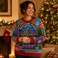 woman wearing an all over print ugly christmas sweater with the nakatomi