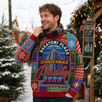 man wearing an all over print nakatomi plaza holiday jumper outdoors at
