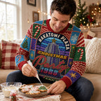 man sitting on a sofa wearing an all over print die hard