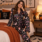 cheers witches lettering on the back of a halloween satin pajama set