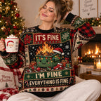 woman wearing an ugly christmas sweater with a dumpster fire design holding