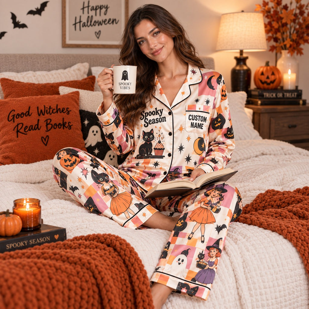halloween satin pajamas in a decorated living room holding a Good Witch