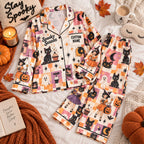 pastel black cat satin pajamas flat lay with a custom name on the chest