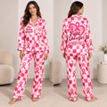 woman modeling breast cancer awareness pajama set with pink ribbons