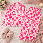 pink checkered ribbon satin pajamas flat lay with a custom name on the chest