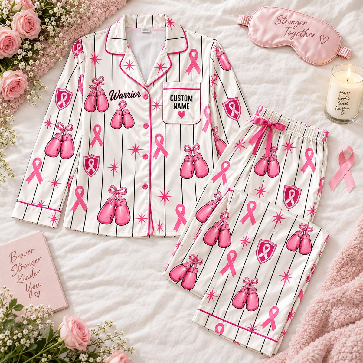 flat lay pink boxing glove satin pajamas with a custom name on the chest