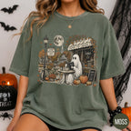 moss green graphic tee featuring ghost and pumpkin scene