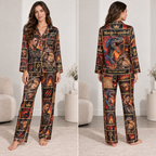 woman wearing a black satin pajama set with a fantasy character print