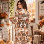 Small Town halloween pajamas woman reading a book on bed