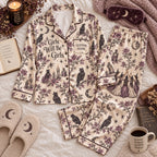 cream gothic floral satin pajamas flat lay with a custom name on the chest