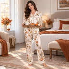 lifestyle shot of the happy thanksgiving satin pyjamas styled in a cozy