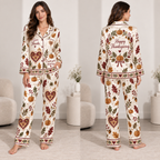 woman wearing thanksgiving satin pyjamas with pumpkin and leaf print