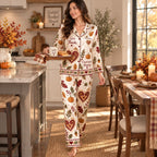 woman stretching arms in thanksgiving themed satin loungewear set