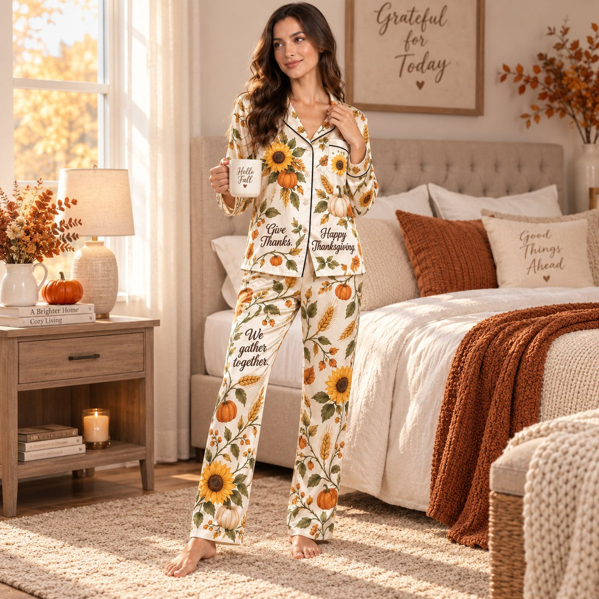 model wearing button up satin pyjamas in autumn pumpkin print