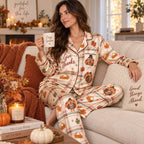 thanksgiving pajama set styled in autumn bedroom with mug and pumpkins