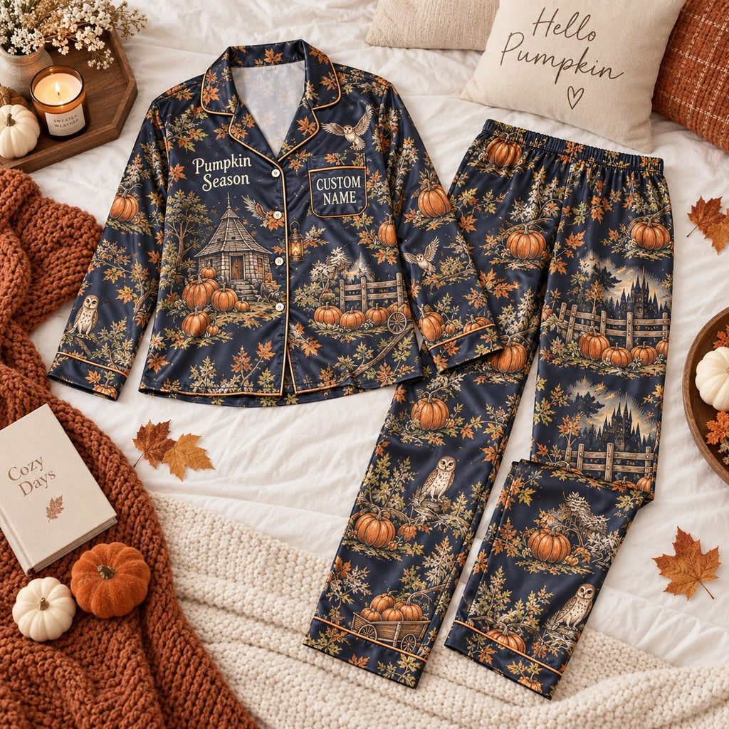flat lay navy pumpkin patch satin pajamas with a custom name on the chest