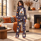 personalized satin pajamas with ghost pattern on a bed