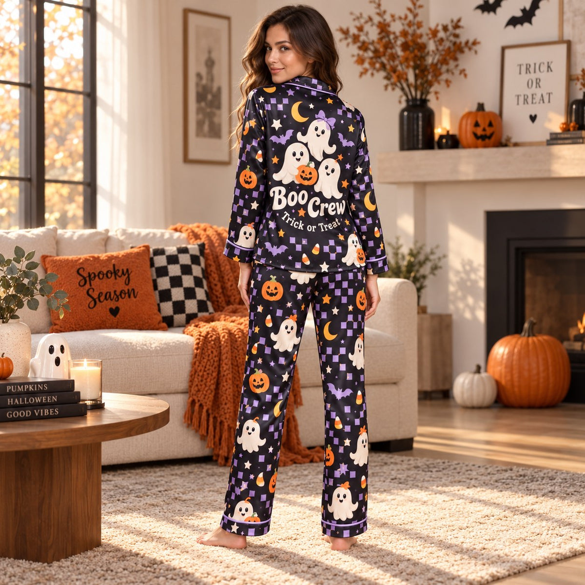 personalized satin pajamas with ghost pattern on a bed