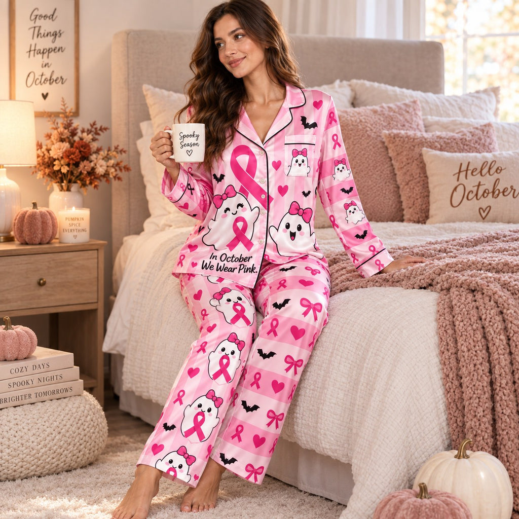 back view showing happy halloween text on pink lounge pyjamas