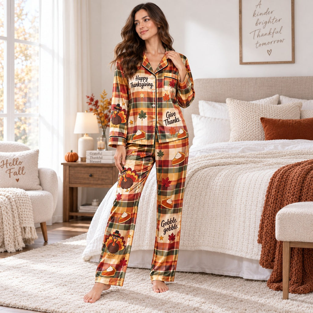 model sitting on couch holding mug in happy thanksgiving lounging pajamas
