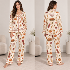 woman modelling cream thanksgiving print satin pyjama set with pumpkins and pies
