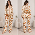 woman modeling cream thanksgiving satin pyjamas with pumpkin pie and leaf print
