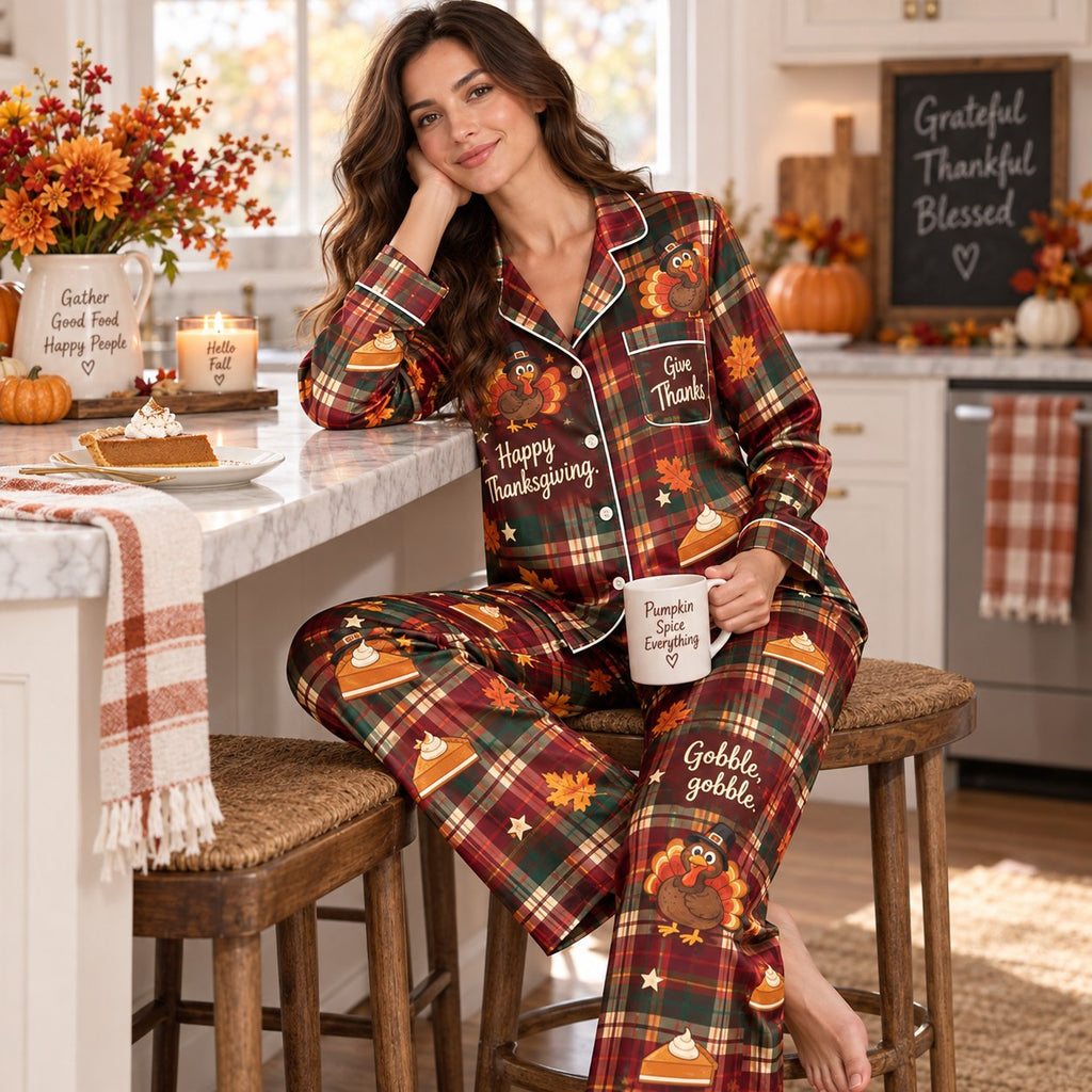 satin pyjamas in cozy bedroom setting holding sweater weather mug