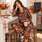 satin pyjamas in cozy bedroom setting holding sweater weather mug