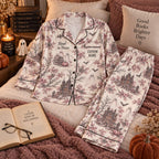 pink ghost toile satin pajamas flat lay with a custom name on the chest