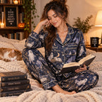 back view of haunted library halloween satin pajamas with ghosts